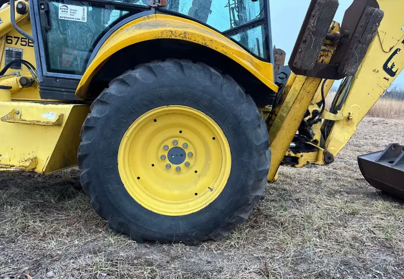 2000 New Holland 675E photo 71